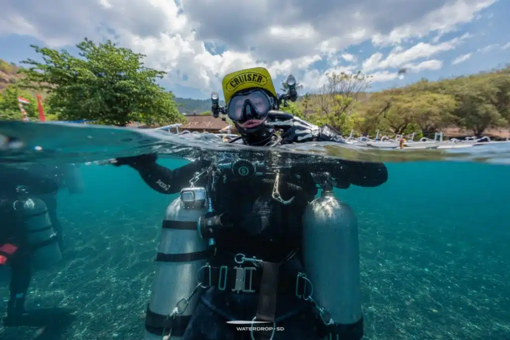amed tulamben diver surface jukung dive