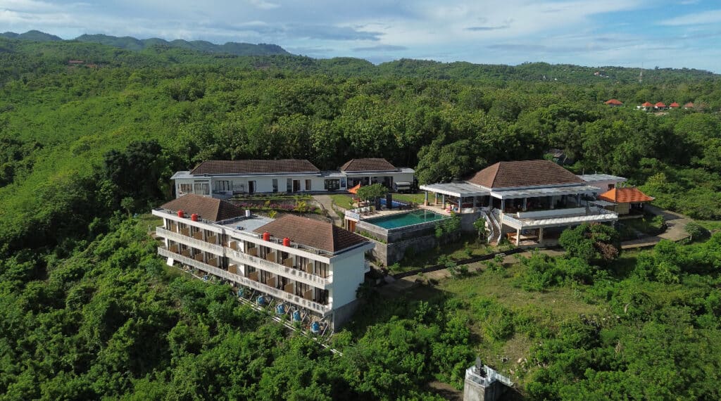 Jukung Dive Nusa Penida Resort overlooking the ocean and surrounding hills
