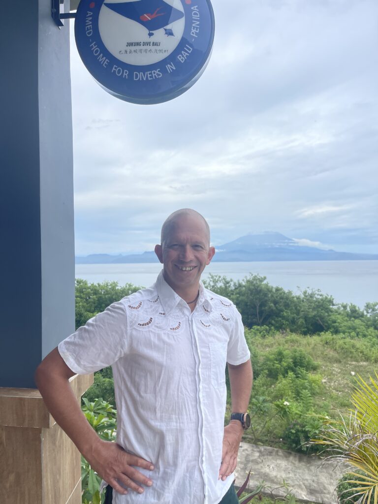 Experienced Jukung Dive Bali dive instructor standing at the dive centre