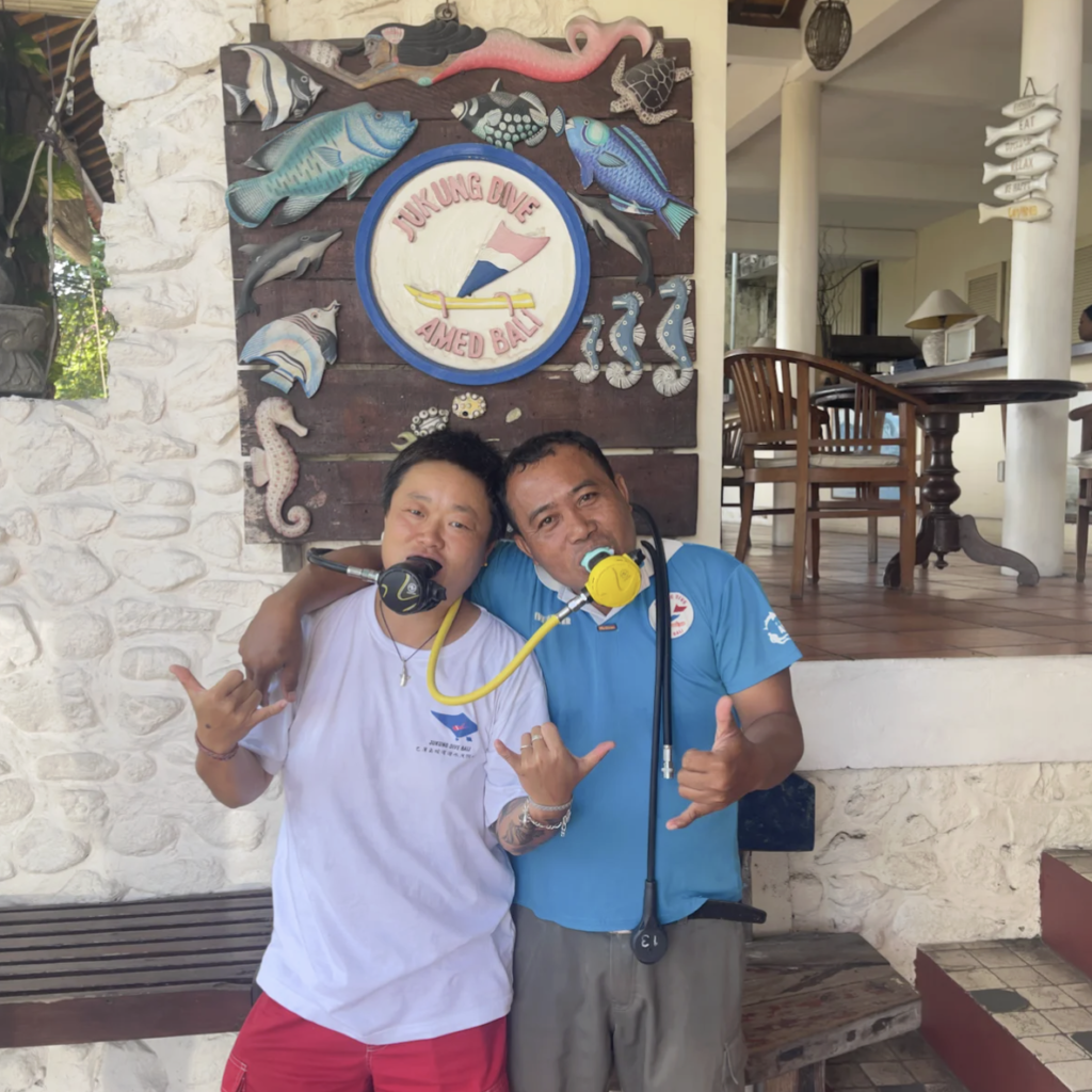 Guests and dive staff at Jukung Dive Amed PADI Dive Centre