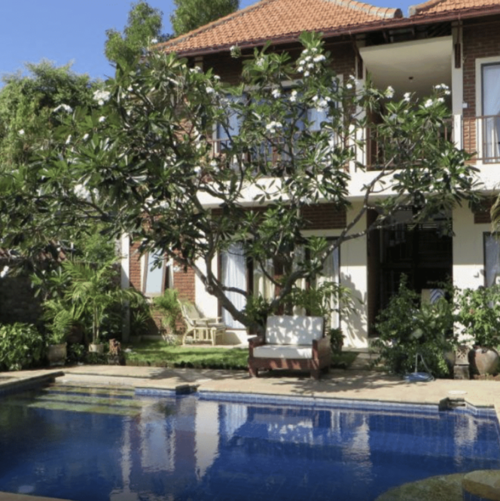 Accommodation and swimming pool at Jukung Dive Amed Resort Bali