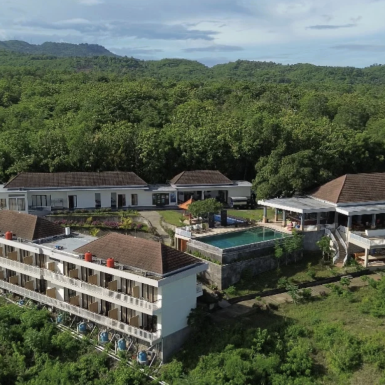 Aerial view of Jukung Dive Resort Nusa Penida and surrounding coastline
