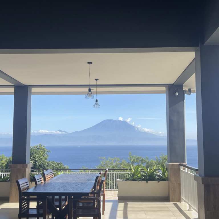 Restaurant terrace with Mount Agung views at Jukung Dive Resort Nusa Penida
