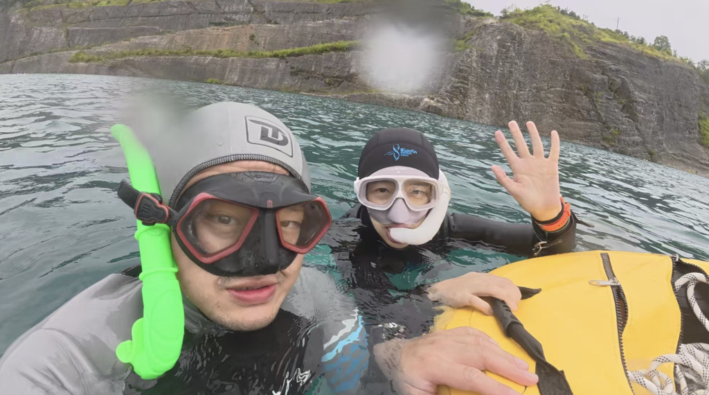 Freediving instructor with a student during an open water freediving session in Amed, Bali