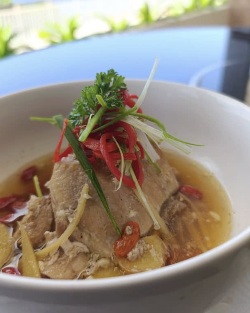 Authentic Indonesian chicken dish served at Sky Penida Rooftop Restaurant in Nusa Penida, prepared with fresh local ingredients.