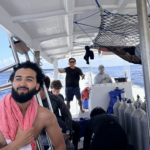 fun divers in Nusa Penida on Jukung Dive Boat, going to Manta Point for fun dives