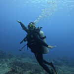 Happy diver underwater