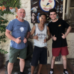 Happy divers in Amed with instructor Wayan